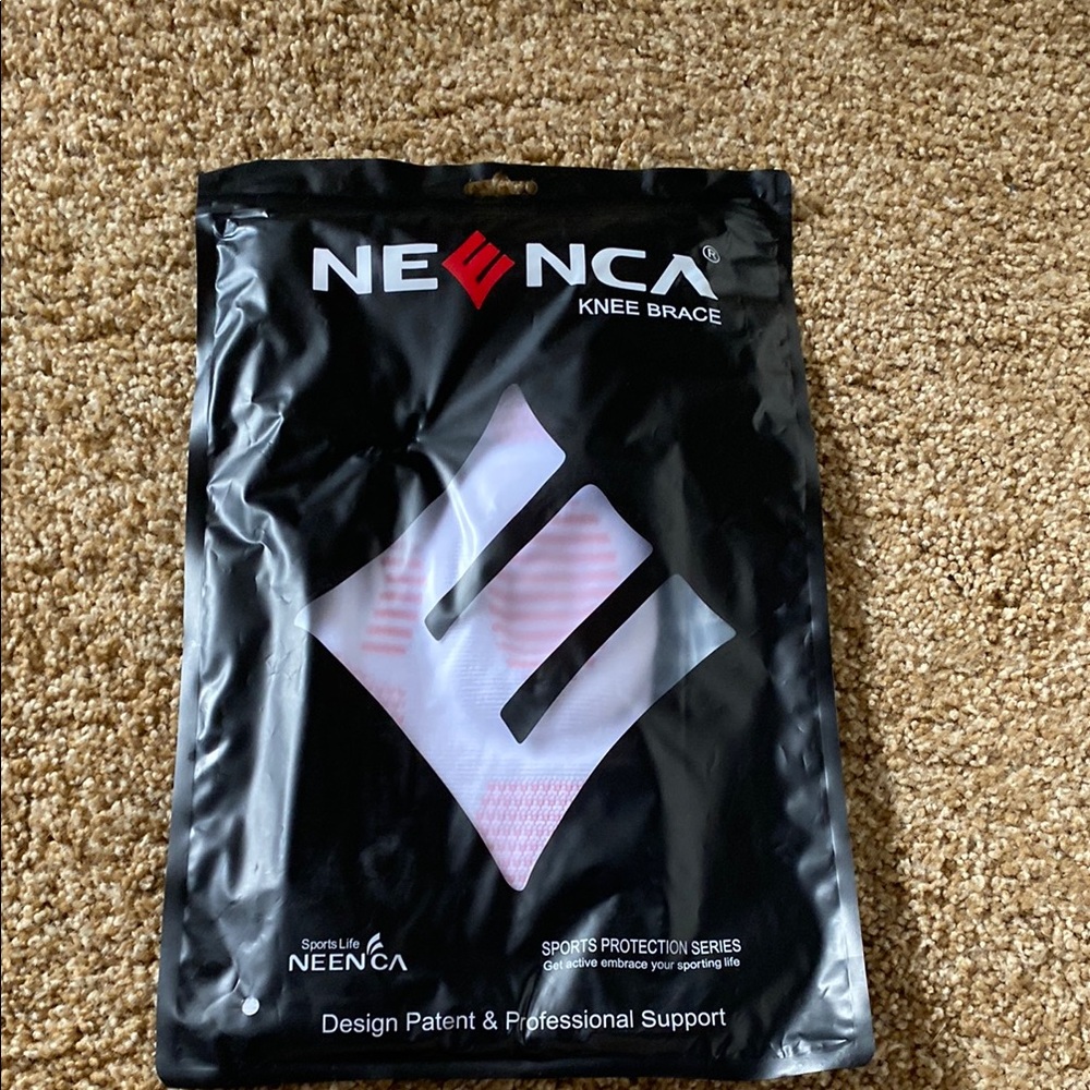 Neenca Knee Support Brace. Never opened in original packaging.